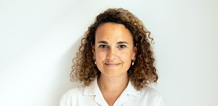 Un primo piano sorridente di Caerina Consigli dell'unità Aziende