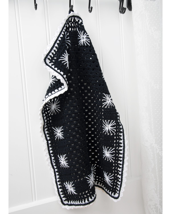 Håndkle med broderete blomster