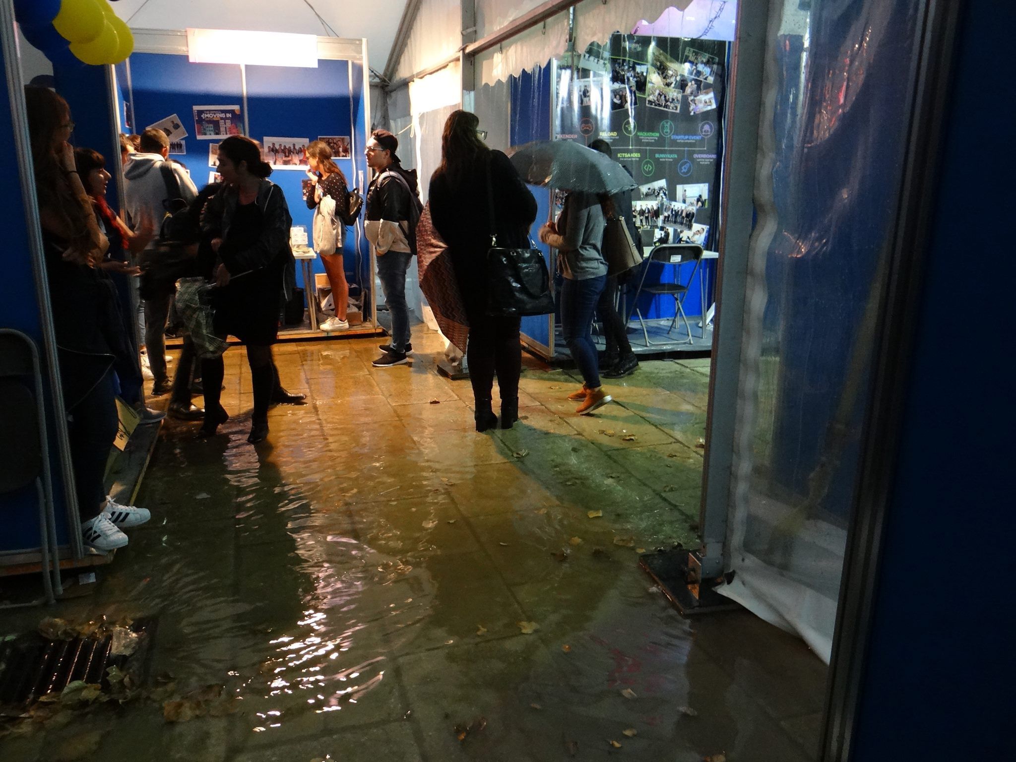 Inches of water covering the area in front of student organisations' stands
