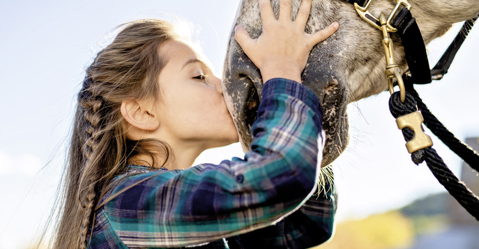 Kind und Pferd
