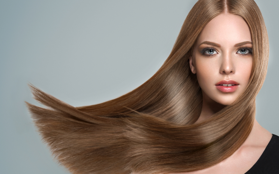 Frau mit langem, braunem Haar | Credit: iStock.com/Sofia Zhuravets