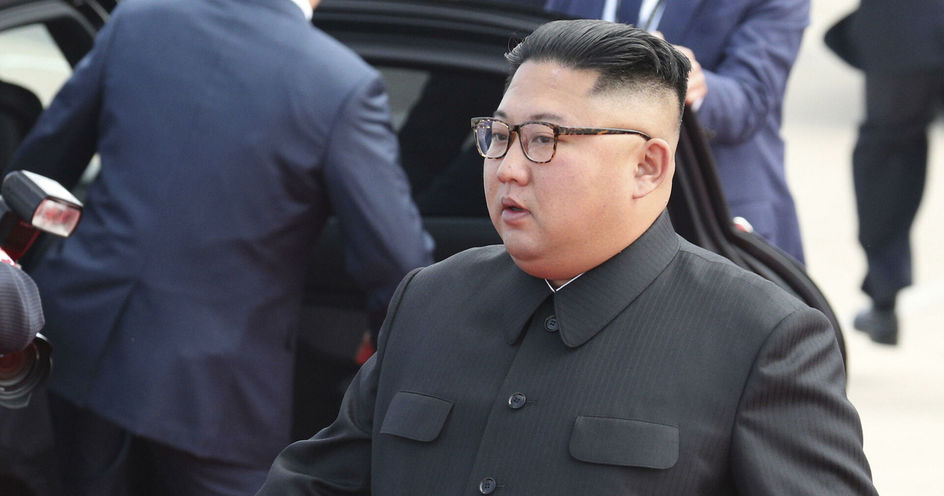 Porträt, im Hintergrund eine Staatskarosse