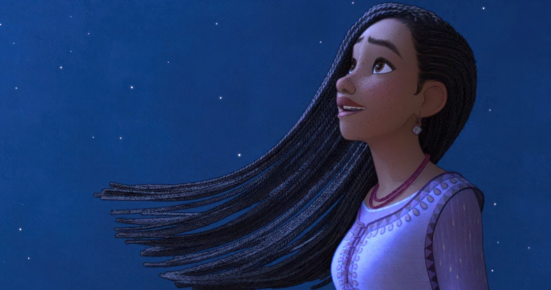 "WISH" ist ein Kinderfilm der eine animierte Person zeigt mit langen schwarzen Haaren, die in den Himmel blickt.