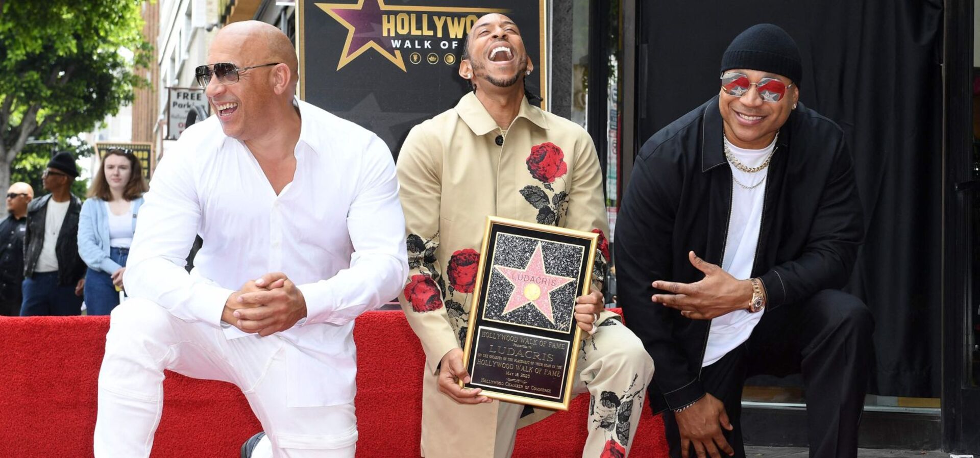 Vin Diesel mit zwei Rappern auf dem Walk of Fame in Hollywood.