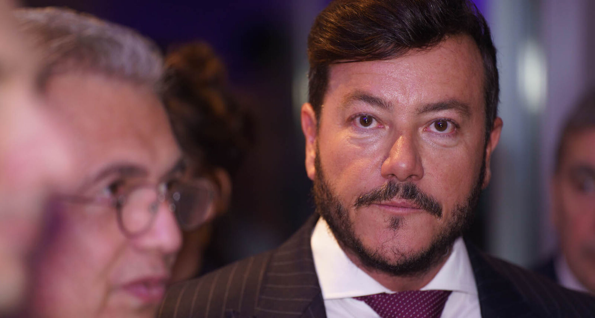 René Benko im Porträt bei einer Veranstaltung