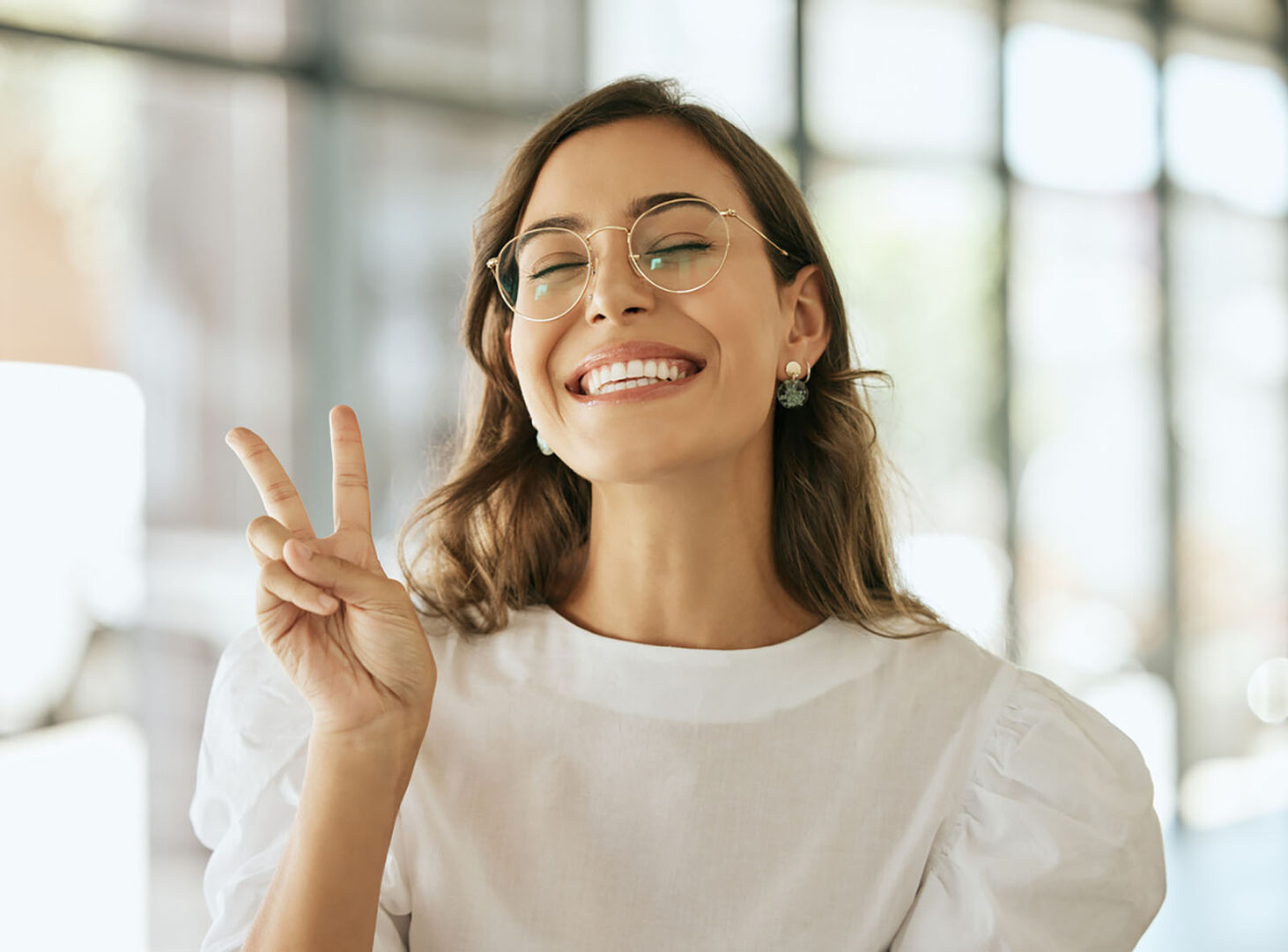 Frau ist glücklich | Credit: iStock.com/PeopleImages