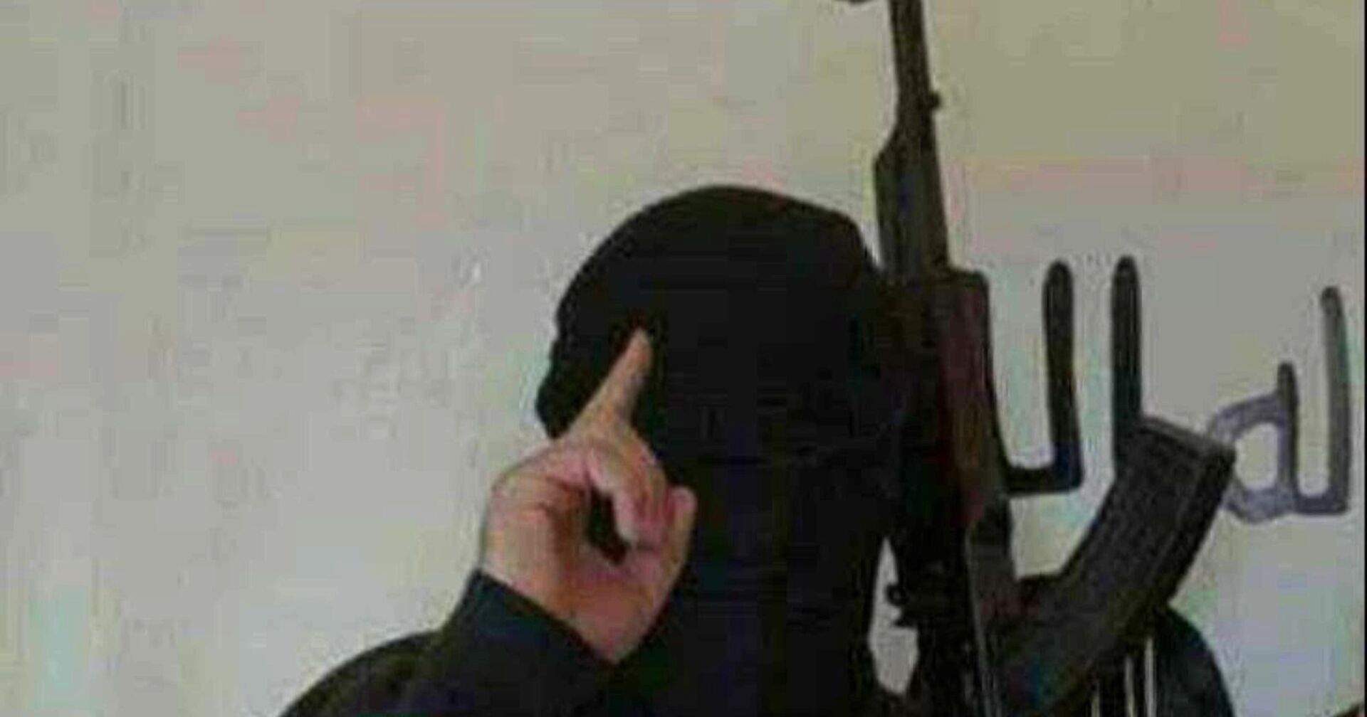 Ein IS-Sympathisant streckt in einer religiösen Geste seinen Finger in die Luft