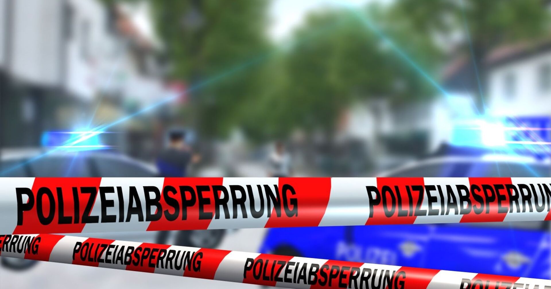 Blaulicht und Polizeisperre.