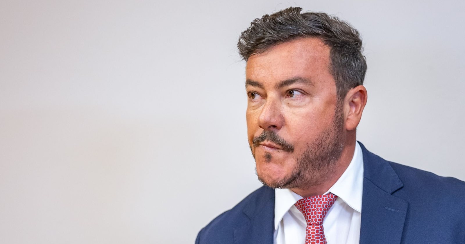 René Benko in einem Anzug