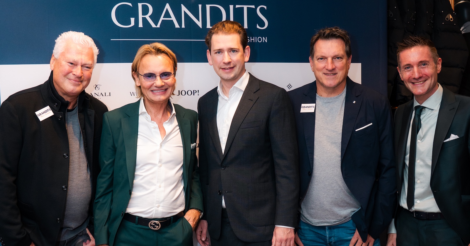 Fünf Männer in der Grandits-Filiale