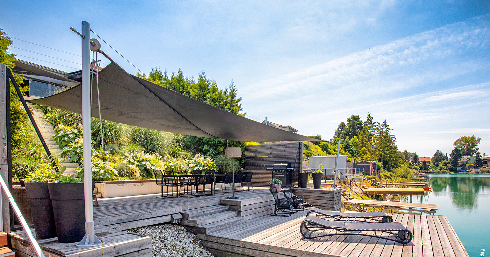 Terrasse am See mit Sonnensegel | Credit: Soliday