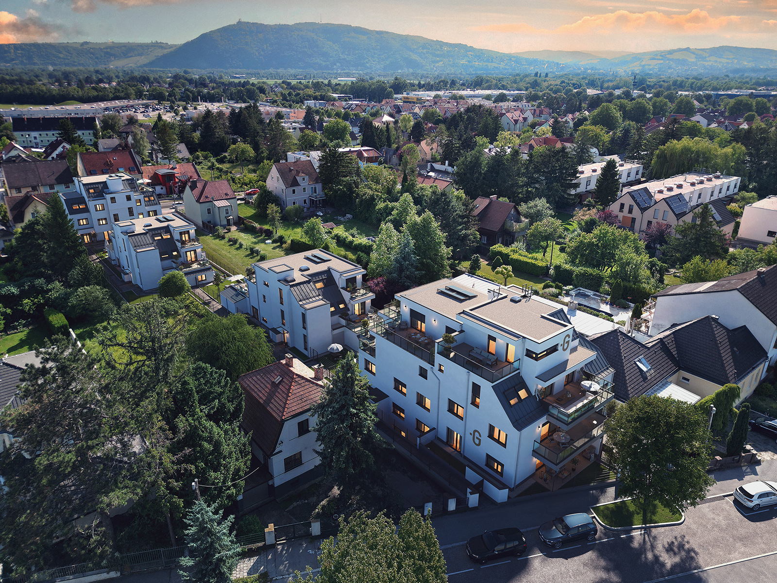 Blick von oben auf Haussiedlung im Grünen | Credit: Glorit Bausysteme