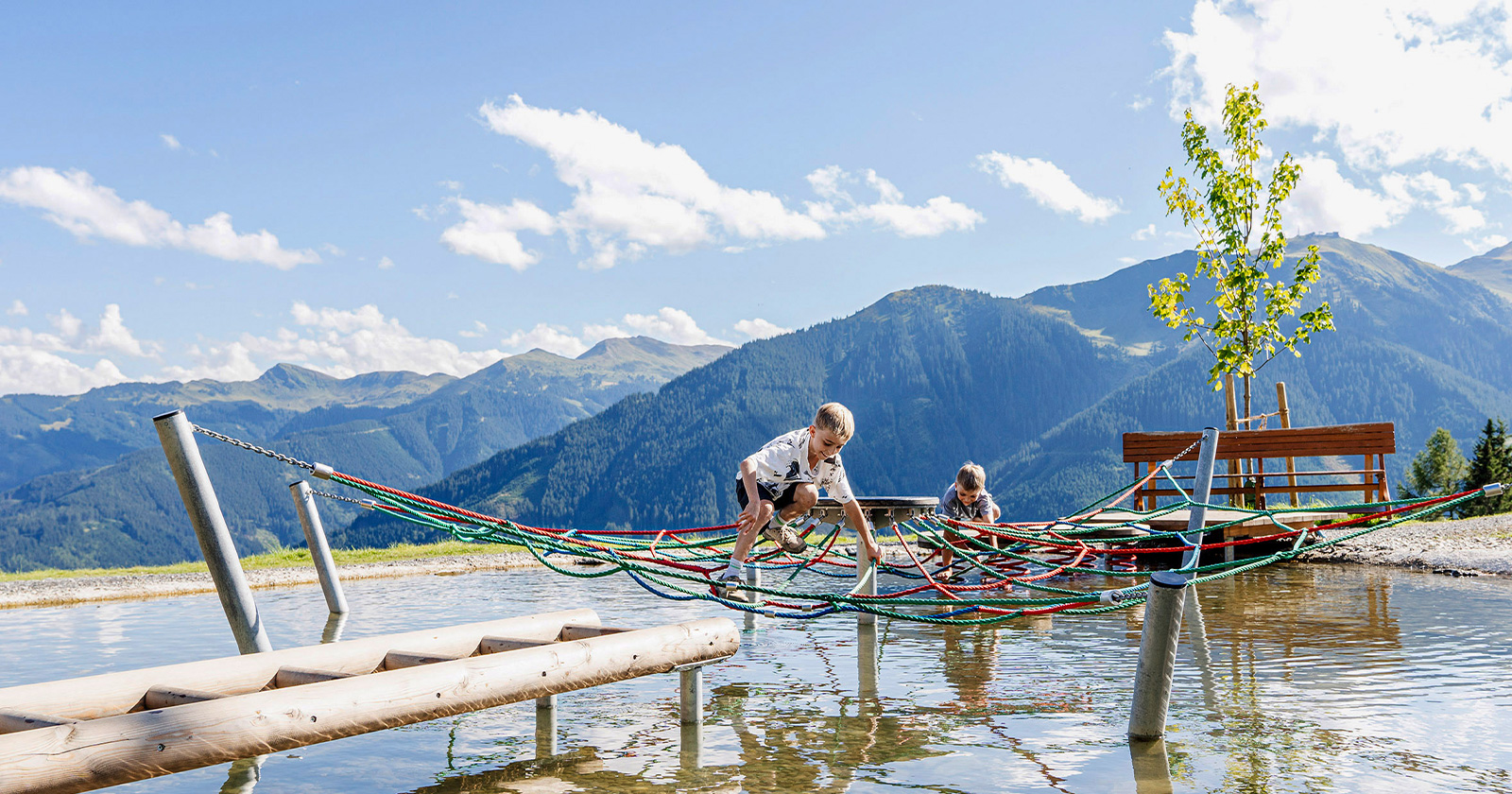 Kinder beim Spielen am Seeufer | Credit: saalbach.com/Karin Pasterer