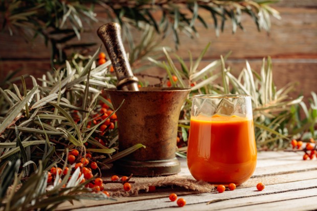 Saft aus Sanddorn | Credit: iStock.com/igorr1
