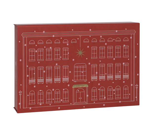 Adventkalender, der an ein rotes Haus erinnert