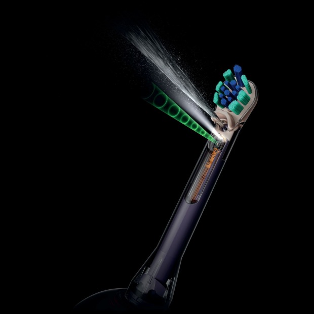 Dyson Zahnbürste CameraJet mit Kamera, Bürstenkopf und gezieltem Mundspülungsstrahl.