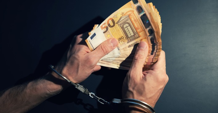 Handschellen und Geld
