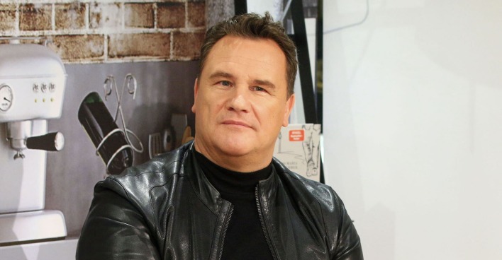 Guido Maria Kretschmer mit einer schwarzen Lederjacke.