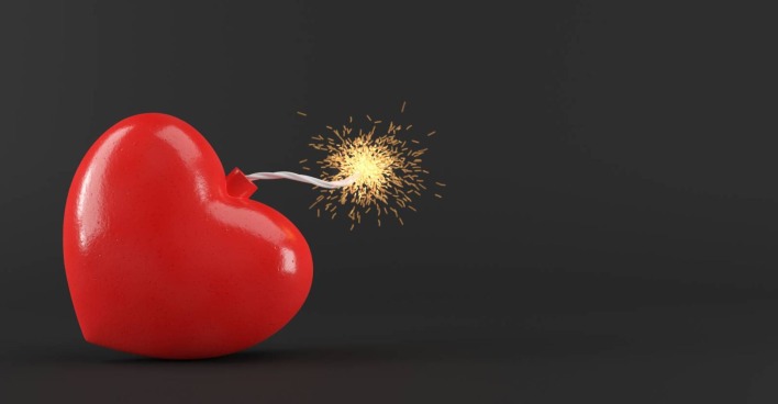 Darstellung einer herzförmigen Bombe mit gezündeter Zündschnur.