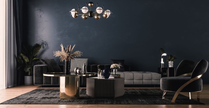 Dunkel eingerichtetes Wohnzimmer | Credit: iStock.com/Iurii Kuznetsov
