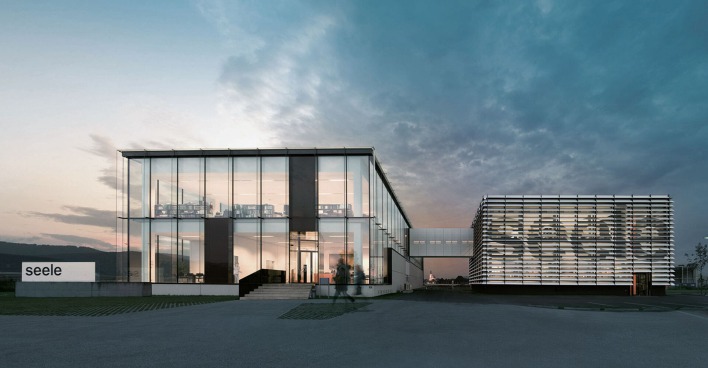 Modernes gläsernes Gebäude bei Nacht | Credit: se-austria