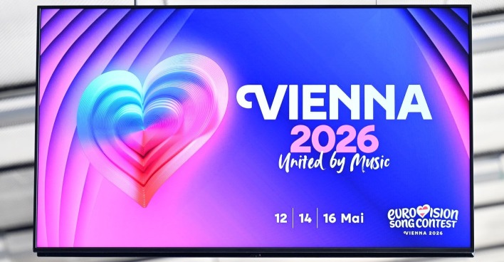Eurovision Song Contest 2026 Wien Logo mit Herzmotiv und Slogan United by Music sowie Terminen im Mai/ Der Eurovision Song Contest 2026 findet in Wien statt und setzt neben Musik auch auf Barrierefreiheit und Inklusion