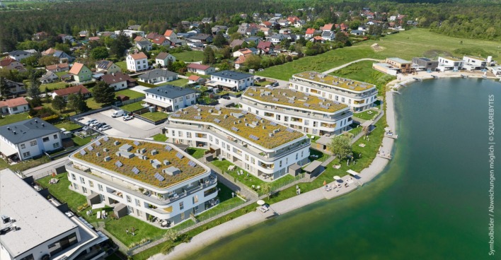 Luftaufnahme von einer modernen Wohnanlage am See | Credit: Symbolbild/Squarebytes (Abweichungen möglich)