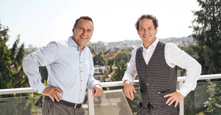 Die zwei Gründer von den COOEE alpin Hotels: Thomas Schmid und Rainer Schönfelder