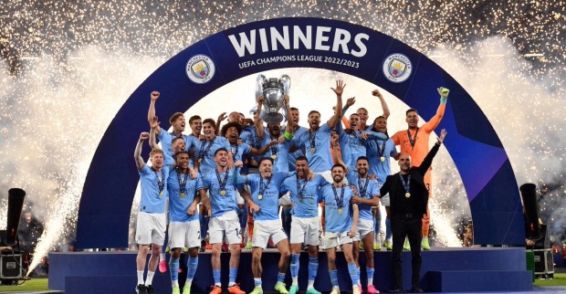 Manchester City Mannschaft jubelt über Sieg der Champions League