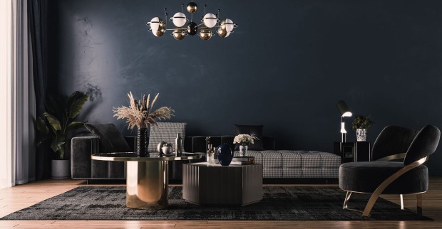 Dunkel eingerichtetes Wohnzimmer | Credit: iStock.com/Iurii Kuznetsov