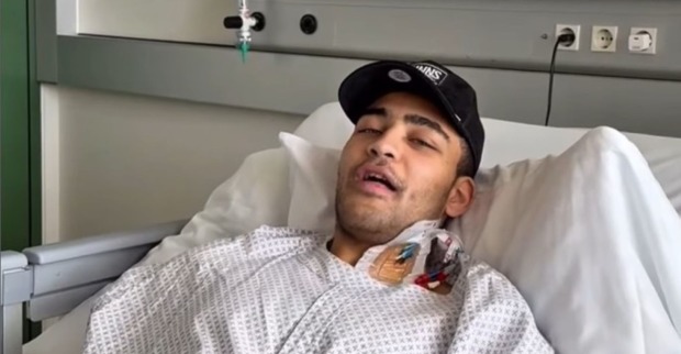 Justin Bunyai liegt im Krankenhausbett