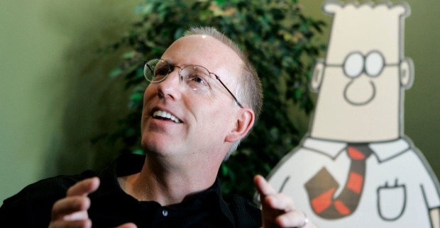 Dilbert-Zeichenr Scott Adams im Portrait, im Hintergrund die von ihm geschaffene Comic-Figur