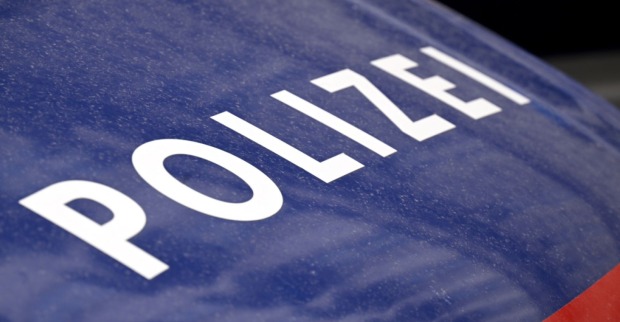 Polizeiauto mit Schriftzug
