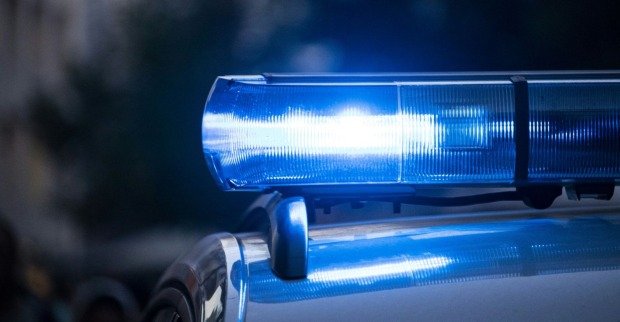 Polizeiauto mit Blaulicht nach Axt-Attacke am Linzer Südbahnhofmarkt in Linz