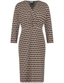 Kleid mit Wickeloptik und Kettendessin