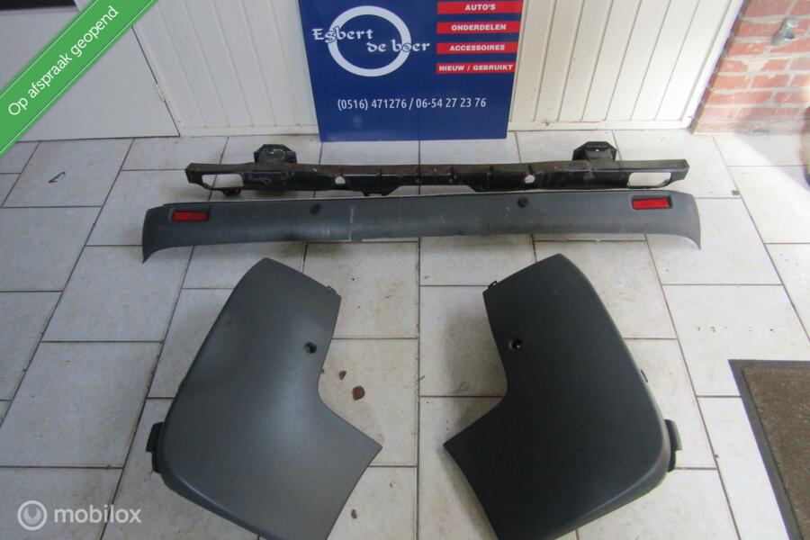 Achterbumper + bumperhoeken Vivaro Trafic Primastar bj 03-14