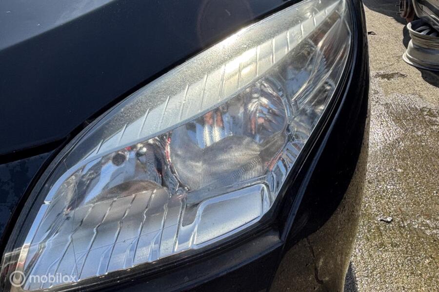 Koplamp links Renault Megane Estate III ('09-'16)