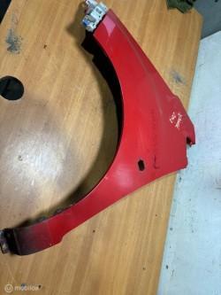 Voorscherm  links rood Chevrolet Spark