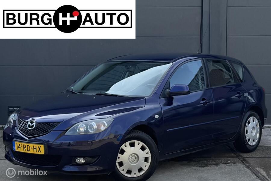 Mazda 3 Sport 1.6 Touring - AIRCO - ELEKTR. RAMEN VOOR + ACHTER - RADIO/CD - CV OP AFSTAND - LEDER STUURWIEL - NL AUTO - NAP - APK T/M 24-02-2026 -