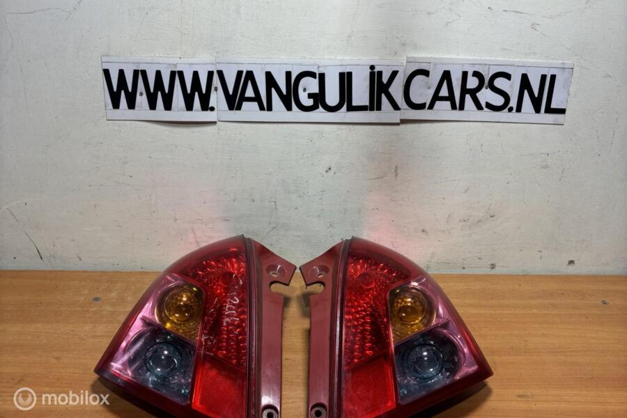 Achterlichten set origineel set Suzuki Swift III ('05-'10)