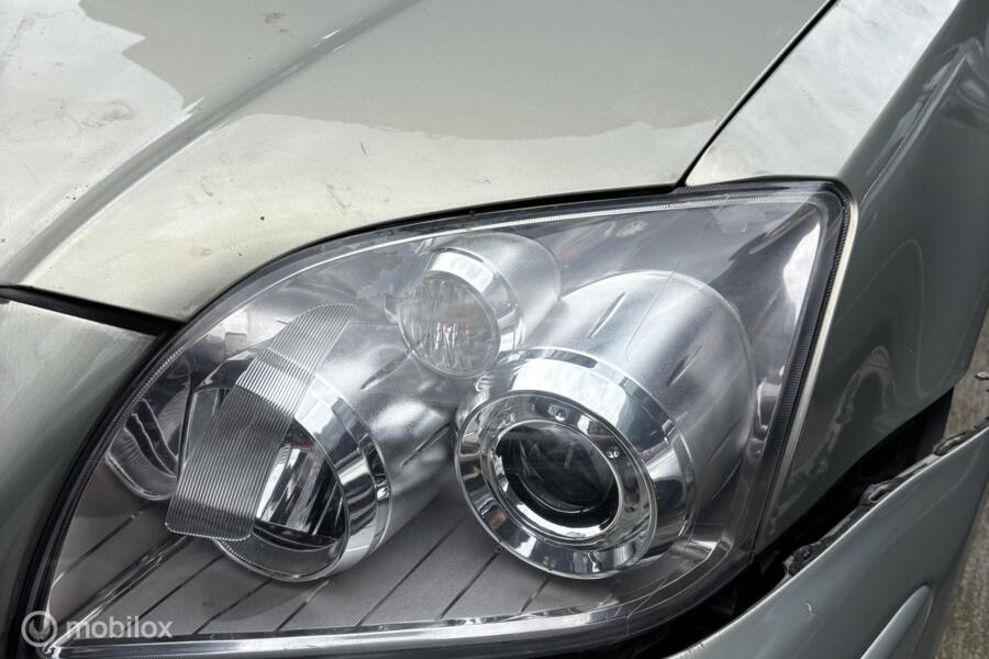 Koplamp links Toyota Avensis Wagon II ('03-'09)