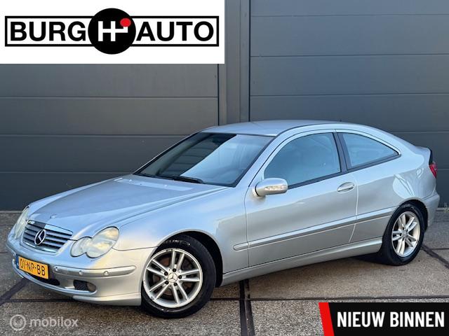 Mercedes C-klasse Sportcoupé 180 Kompressor - CLIMATE CONTROLE - CRUISE CONTROLE - LM VELGEN - PDC - ELEKTR. RAMEN - CPV - RADIO/CD - NAP - NL AUTO - APK T/M 31-12-2025 -