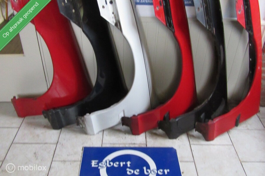 Spatbord voorscherm L+R Opel Calibra, bj '90 -'97
