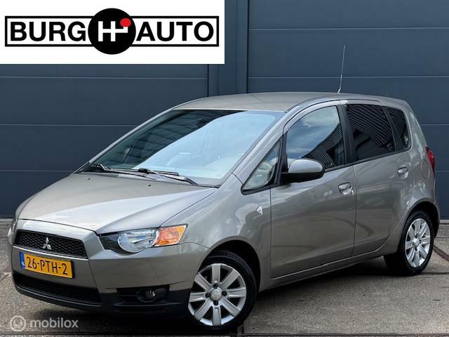 Mitsubishi Colt 1.3 Edition Two - AUTOMAAT - AIRCO - CRUISE CONTROLE - NAVIGATIE - PARKEERSENSOREN ACHTER - LM VELGEN - GETINT GLAS - NAP - NL AUTO - APK T/M 07-03-2026 -