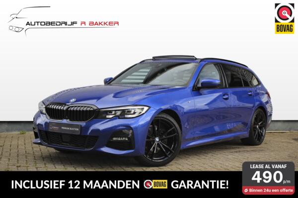 BMW 3-serie Touring 320i M sport // Portimao Blue | BTW auto | Panoramadak | Trekhaak | Sfeerverlichting | CarPlay & Android Auto