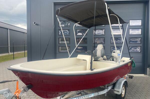 Riga 430 / Consoleboot / 15 pk 4 takt / Biminitop / Trailer!