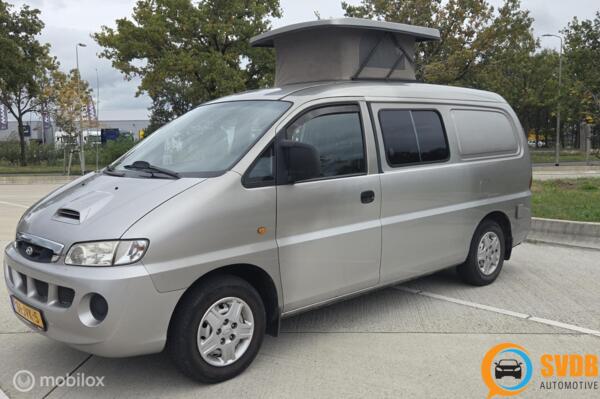 Hyundai H200 2.5 TDI kampeerwagen/hefdak/keuken/koelk/trekh.