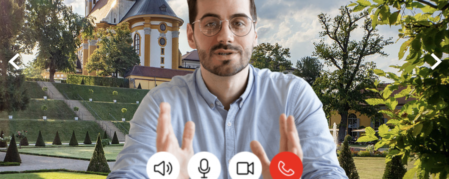 Eine Videokonferenz und im Hintergrund ist ein Wahrzeichen zu sehen.