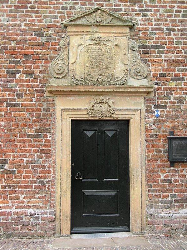 Restauratie polychromie en verguldwerk deuromlijsting kerk Oldehove in opdracht van de gemeente Zuidhorn