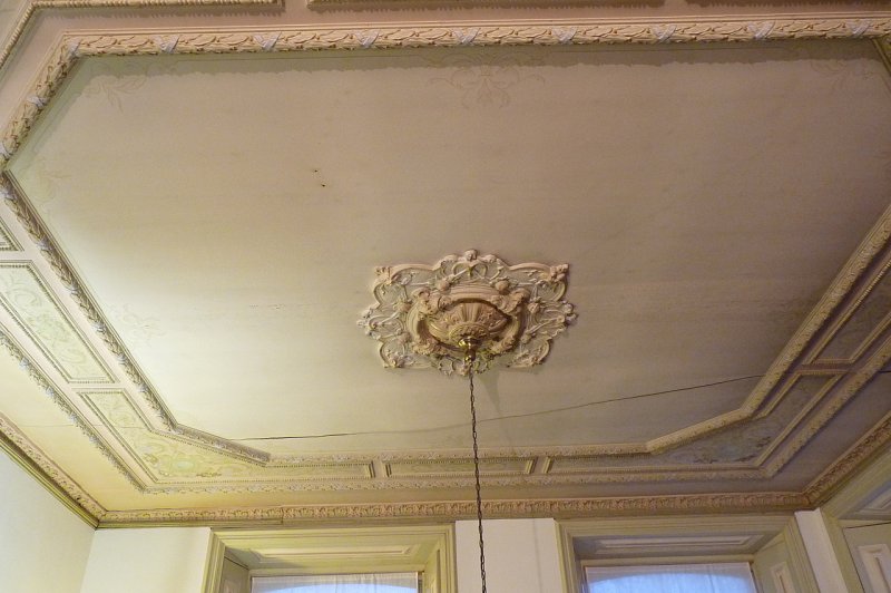Herstel polychromie plafond na aardbevingsschade in opdracht van particulier